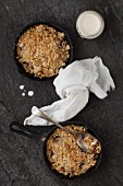 Chocolate and pear crumble in cast iron pans