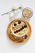 Smoothie bowl with banana, grapevine and oat cocos topping