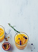 Peach and lavender cooler with sparkling water and passion fruit