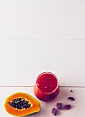 A papaya and raspberry drink