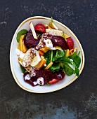 A beetroot, spinach, peach and strawberry salad (Lebanon)