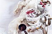 Yogurt dessert (mashed banana, chia seeds, frozen raspberries, roasted hazelnuts, coffee)
