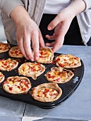 Mini cheese and red pepper quiches