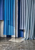 Curtain fabrics in blue tones