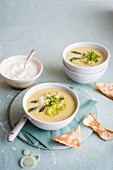 Spring onion and asparagus soup with sour cream and toast