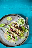 Grilled fish tacos with guacamole (Mexico)