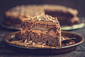 Slice of homemade chocolate cake in the plate