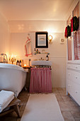 Festively decorated bathroom with cosy lighting