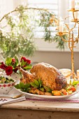 Roast turkey stuffed with vegetables, herbs and clementines