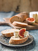 Homemade French baguette slices with brie and figs