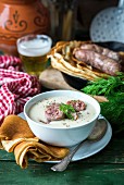 Machanka (sausage soup, Belarus) with blinis and beer
