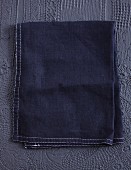 A black cloth on a black background