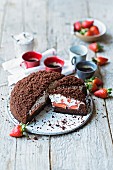 Strawberry cake with chocolate sprinkles and eggnog cream