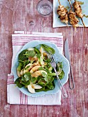 A spinach and celery salad with apples and peanut sauce - 'Tiger in the Jungle'