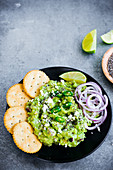 Guacamole dip with chia seeds and fresh chilli peppers