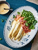 White asparagus with watercress and serrano ham