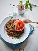 Tomatoes stuffed with parsley, peppers, and quinoa