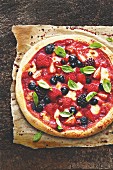 A sweet berry pizza with mozzarella
