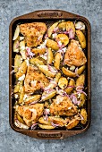 Greek sheet pan chicken and potatoes with feta and capers