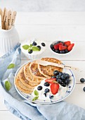 Pancakes with cottage cheese and berries