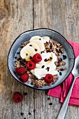 Overnight oats with chocolate, banana and raspberries