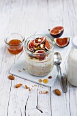 Overnight oats with figs and honey in a glass