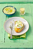 Toasted bread with broad bean cream and a poached egg