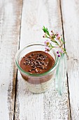 Overnight oats with vegan chocolate cream in a glass