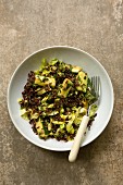 Red rice, zucchini, and white cabbage salad