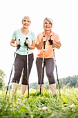 Two women with walking poles