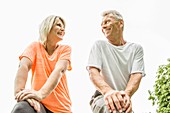 Couple smiling, low angle view