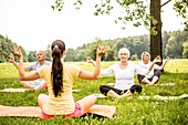 Yoga class in field