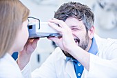 Female patient having eye examination