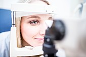 Eye examination of woman