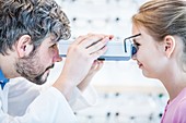 Female patient having eye examination
