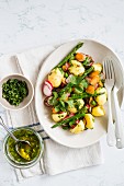 Potato salad with asparagus and radishes