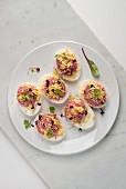 Deviled eggs with beetroot filling