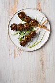 Yakitori with grilled chicken balls and sauce (Japan)
