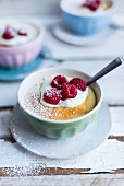 Lemon pudding with raspberries