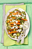 Green lentil salad with avocado, feta and pan-fried carrots