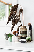 Old seventies vases and bowls on dressing table