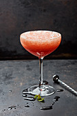 A strawberry champagne cocktail