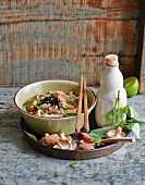 Asian soup with shiitake mushrooms, algae and tofu