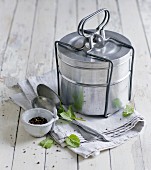 A Tiffin carrier, practical for transporting soup