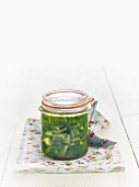 Lacto fermented green peppers in a jar