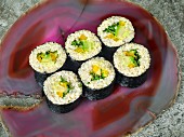 Vegetarian quinoa sushi with vegetables, fresh cheese and white miso paste