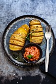 Hasselback potatoes with raw ketchup
