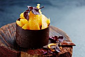 Orange fillets in a chocolate cup