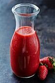 Strawberry smoothie in a carafe
