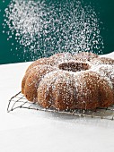 A bundt cake dusted with powdered sugar